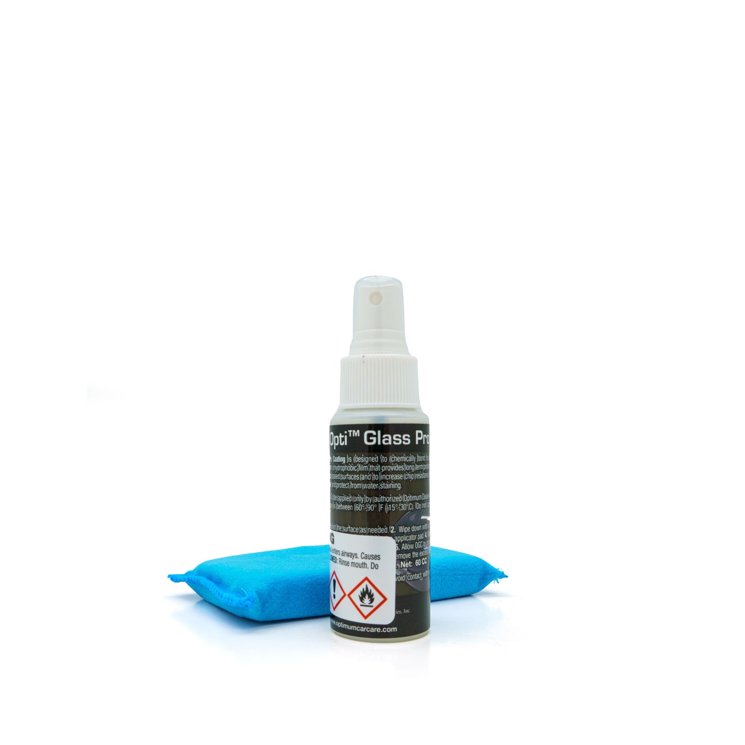 Opti Glass Pro ceramic glass coating spray bottle with white cap and red hazard symbols next to a bright blue rectangular applicator pad on a clean white studio background